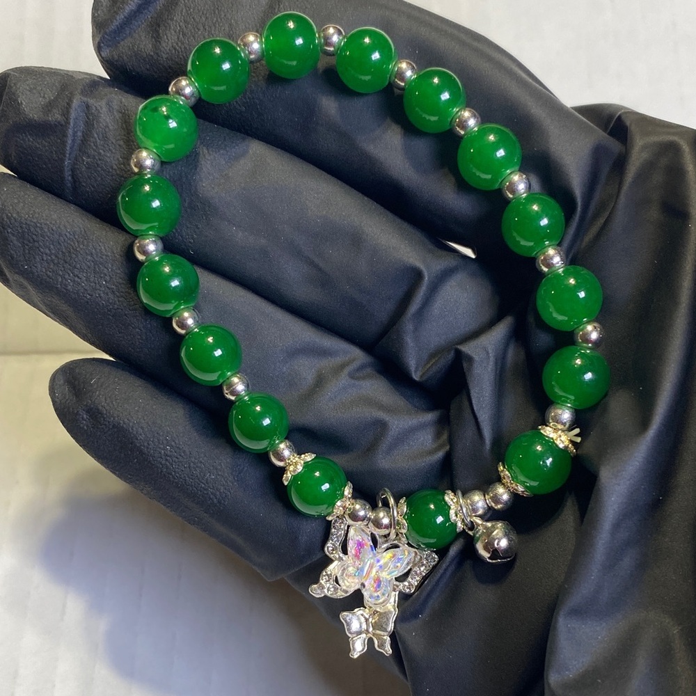 Green Beaded Bracelet with Silver Charm